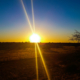 Namibia Atemberaubende Landschaften Lodges und wilde Tiere- Sonnenuntergang in der Kalahari